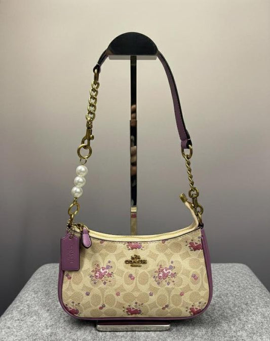 Coach Teri Shoulder Bag Signature Canvas Powder Apricot Purple