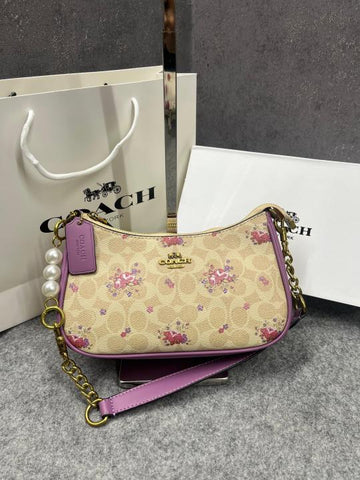 Coach Teri Shoulder Bag Signature Canvas Powder Apricot Purple