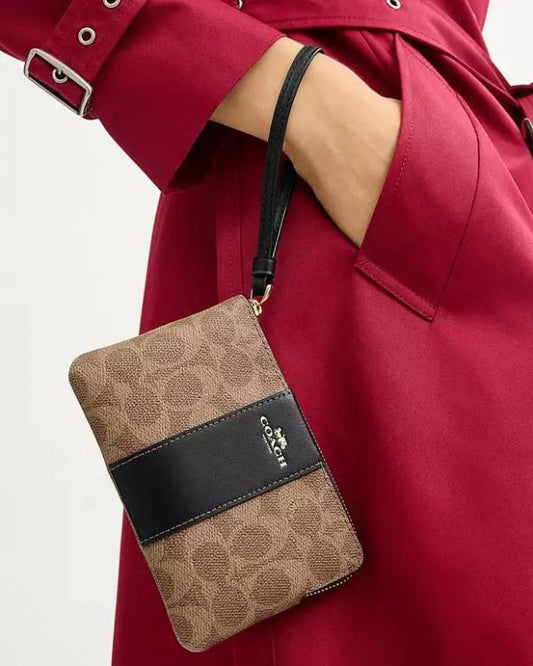 Coach Corner Zip Wristlet In Signature Canvas With Black Stripe