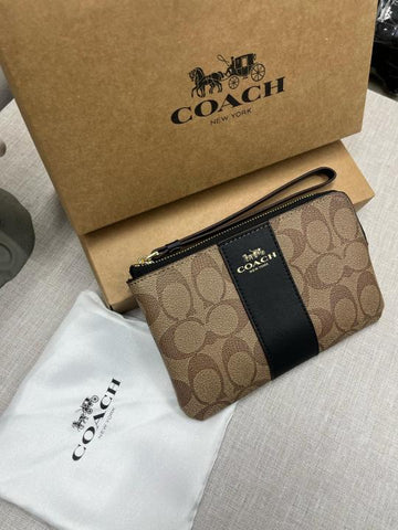 Coach Corner Zip Wristlet In Signature Canvas With Black Stripe