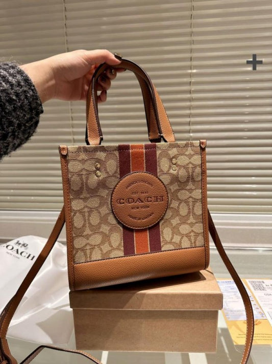 Coach Dempsey Carryall In Signature 22 Tote Caramel