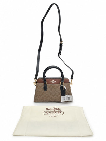 Coac_h Darcie Signature Canvas Satchel Bag With Crossbody Strap And Dust Bag (Apricot)