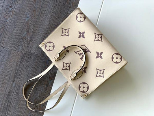 Louis_Vuitton_OnTheGo_MM_Bicolor_Monogram_Handbag_With_Dust_Cover_&_Carry_Bag_Purple_M45320